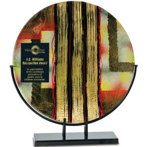 Art glass award on black stand