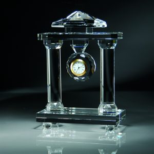 Clock on crystal column pedestal