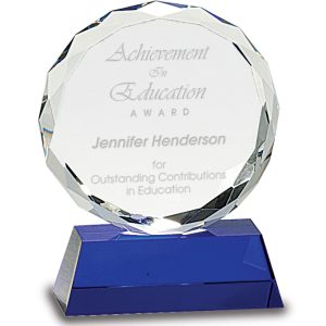 Faceted round crystal award on blue base