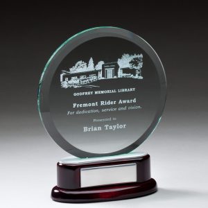 Jaded glass circle on piano finished rosewood base